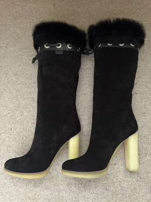 Gucci Stiefel, Leder, schwarz | LOOP Marketplace