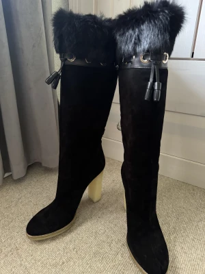 Gucci Stiefel, Leder, schwarz | LOOP Marketplace