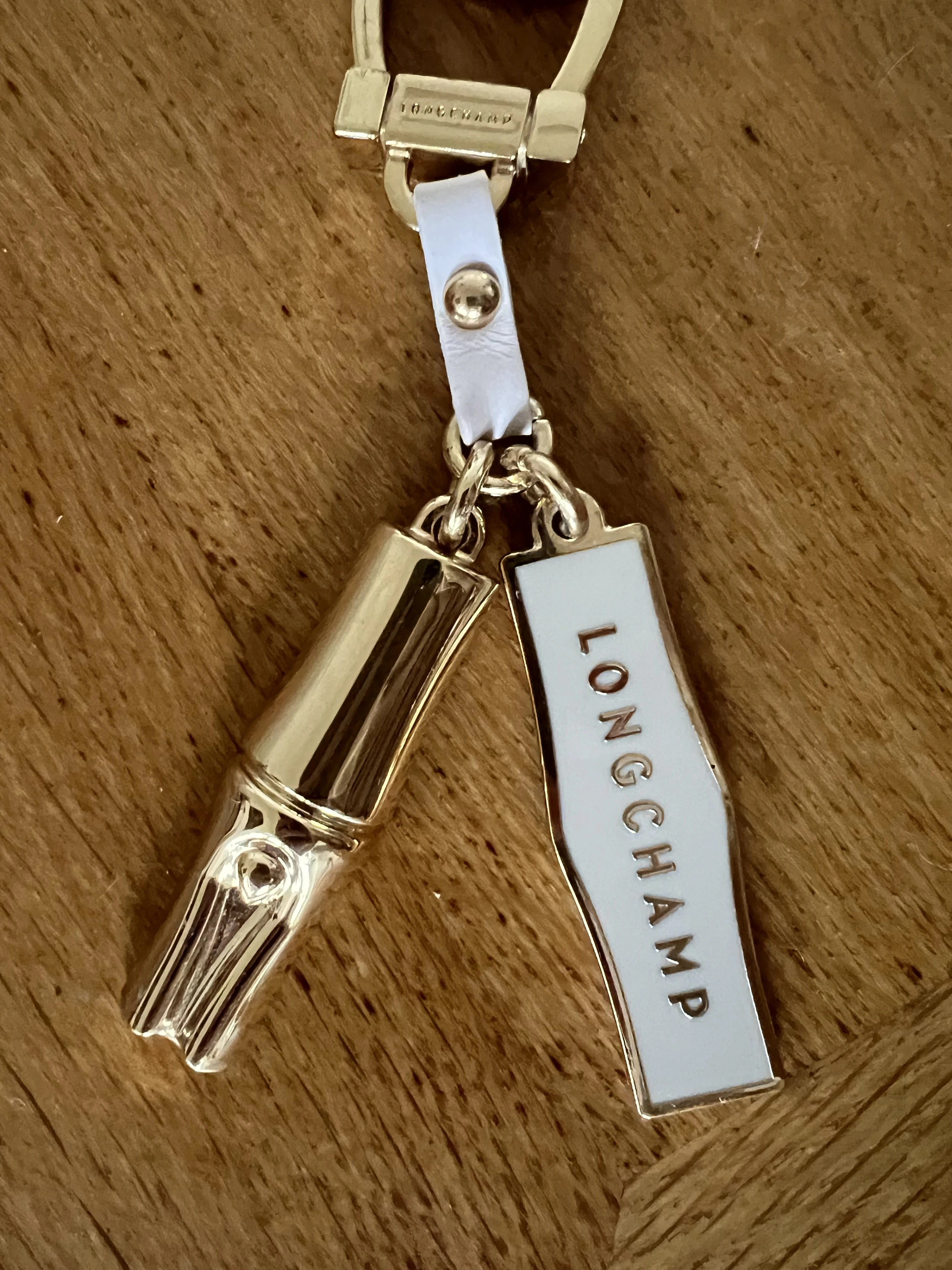 Longchamp Schlüsselanhänger gold | LOOP-Marktplatz