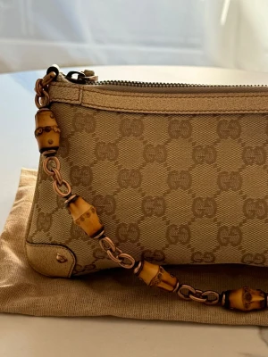 Wunderschöne Gucci Tasche/ Pochette | LOOP Marketplace