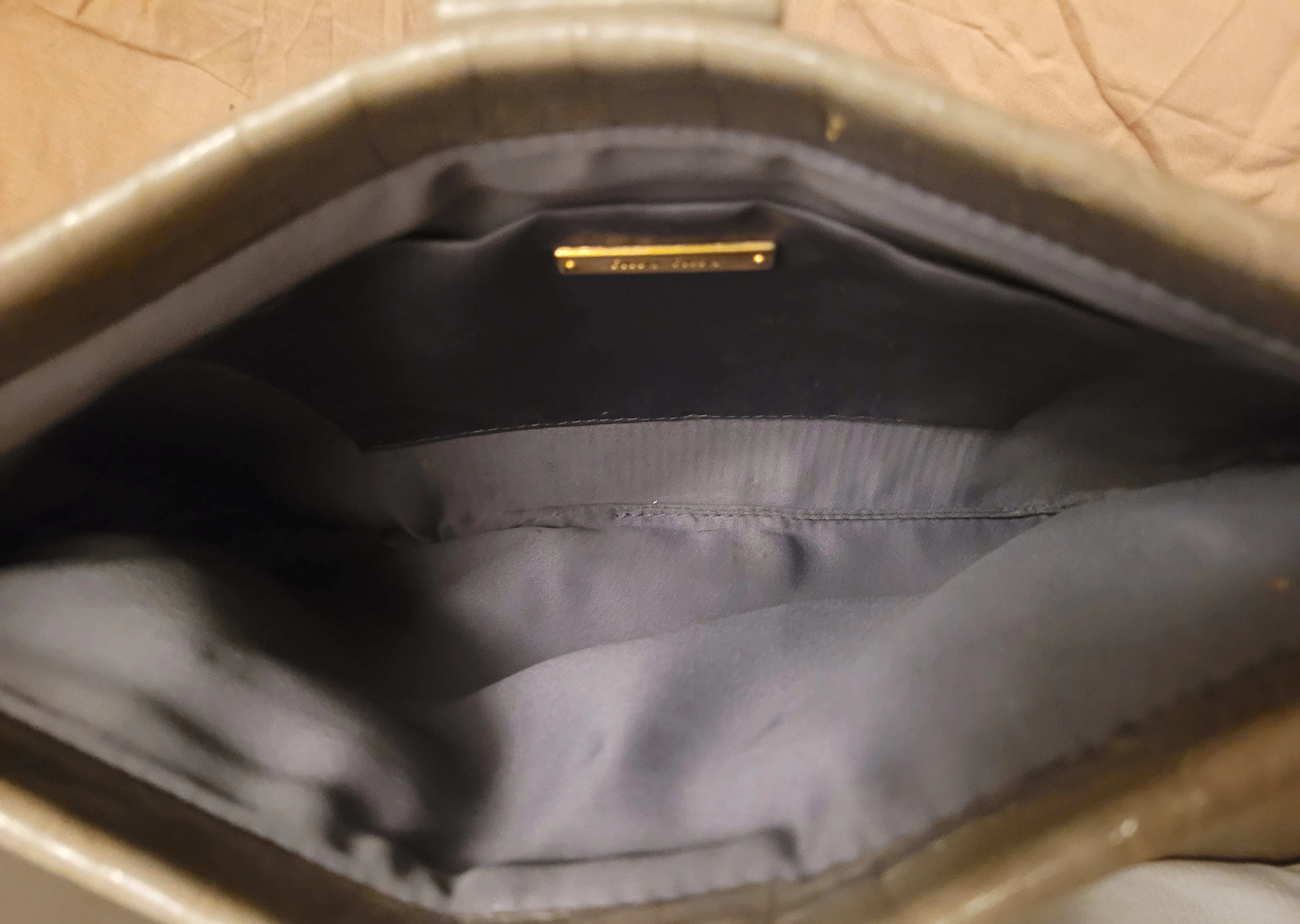 Miu Miu clutch | LOOP Marketplace