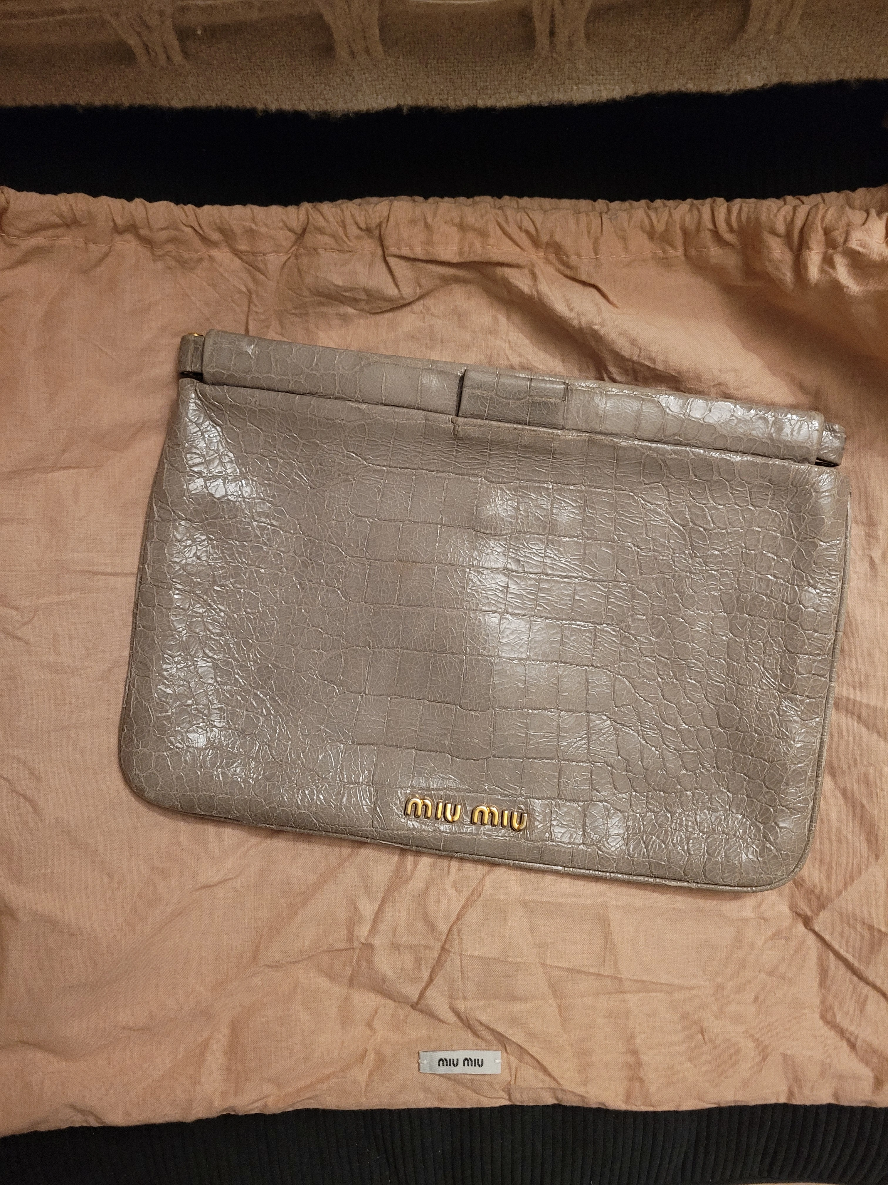 Miu Miu clutch | LOOP Marketplace