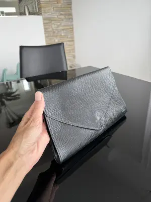 Louis Vuitton Clutch | LOOP-Marktplatz