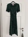 Green and black dress