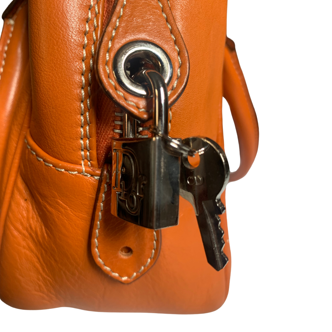 Dior orange leather handbag | LOOP-Marktplatz
