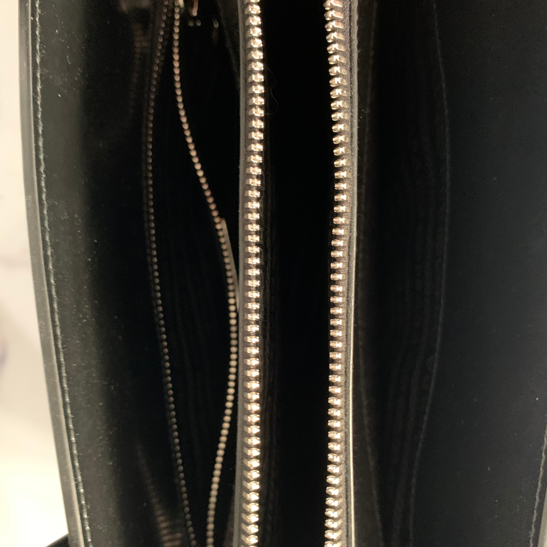 Black patent leather Prada bag