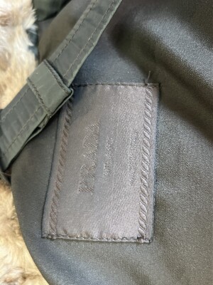 Khaki Prada down jacket | LOOP-Marktplatz
