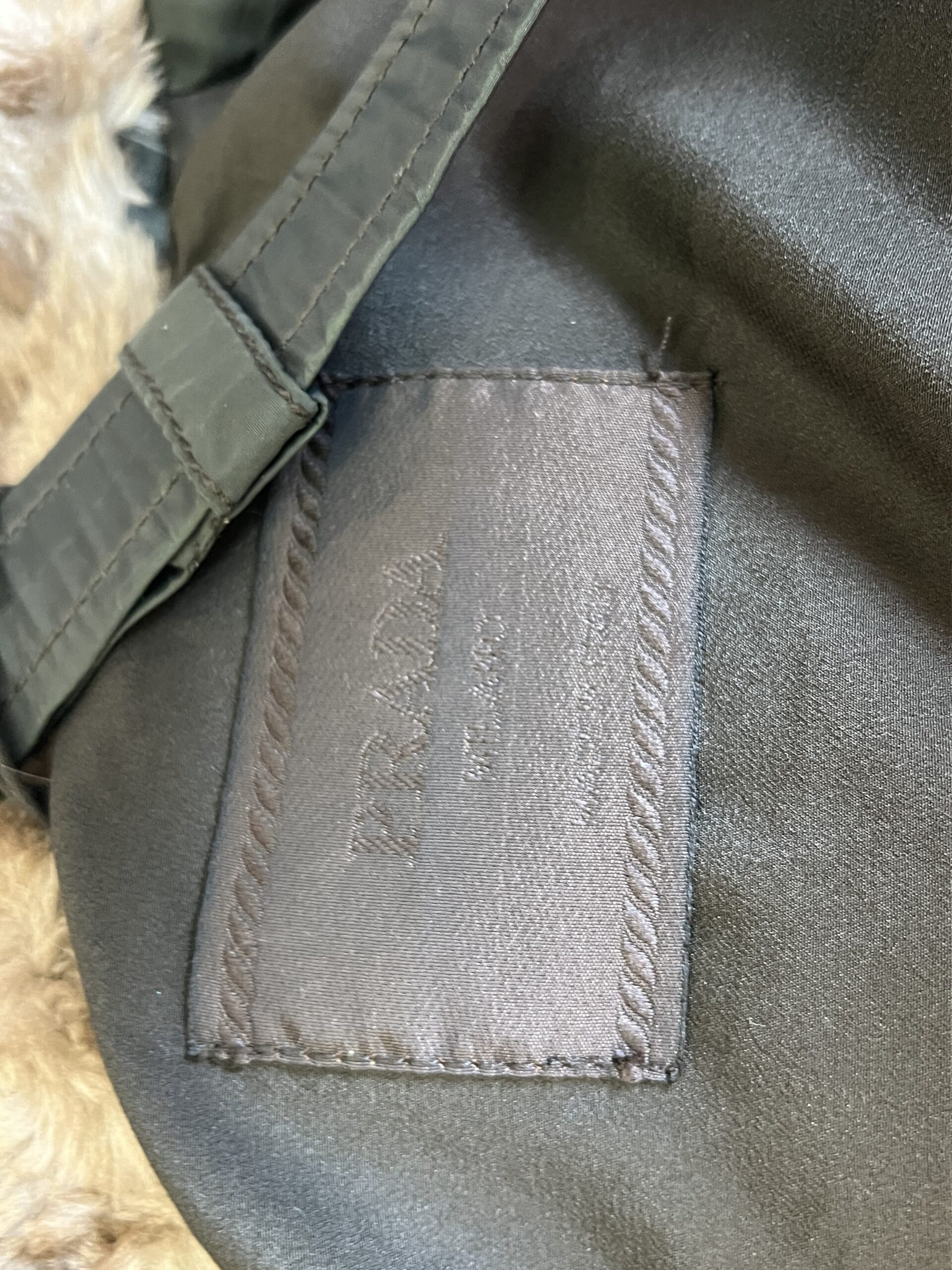 Khaki Prada down jacket | LOOP-Marktplatz