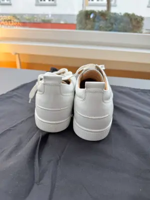CHRISTIAN LOUBOUTIN sneakers | LOOP-Marktplatz