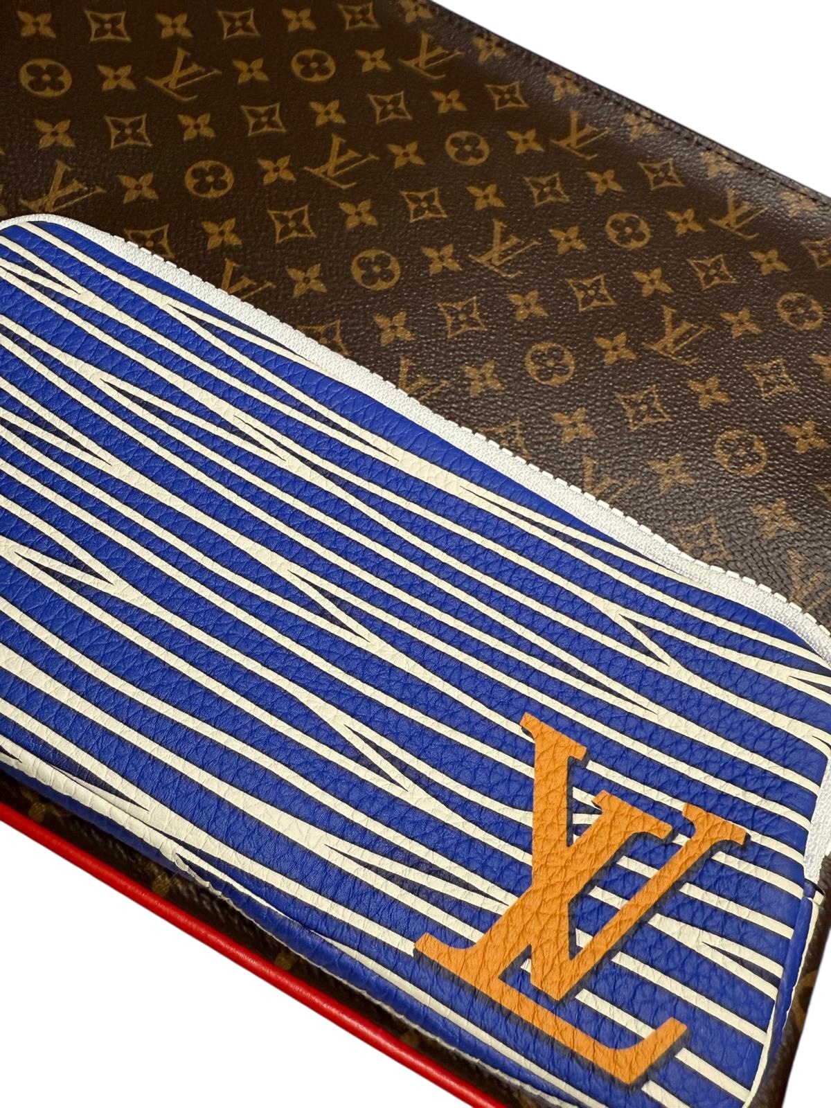 Louis Vuitton clutch | LOOP-Marktplatz