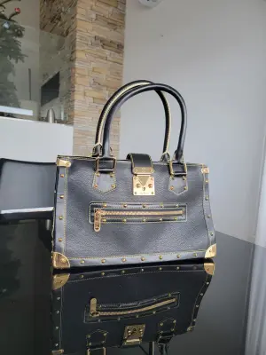LOUIS VUITTON Le Fabuleux Suhali Leder | LOOP Marketplace