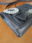 MIU MIU Matelassé-Tasche mit Kristallschnalle